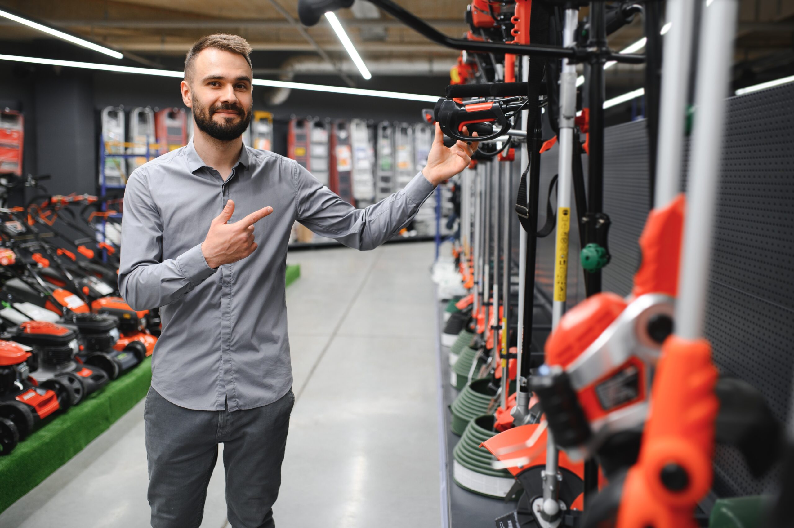 Customer browsing outdoor power equipment in a well-organized store, highlighting inventory optimization.